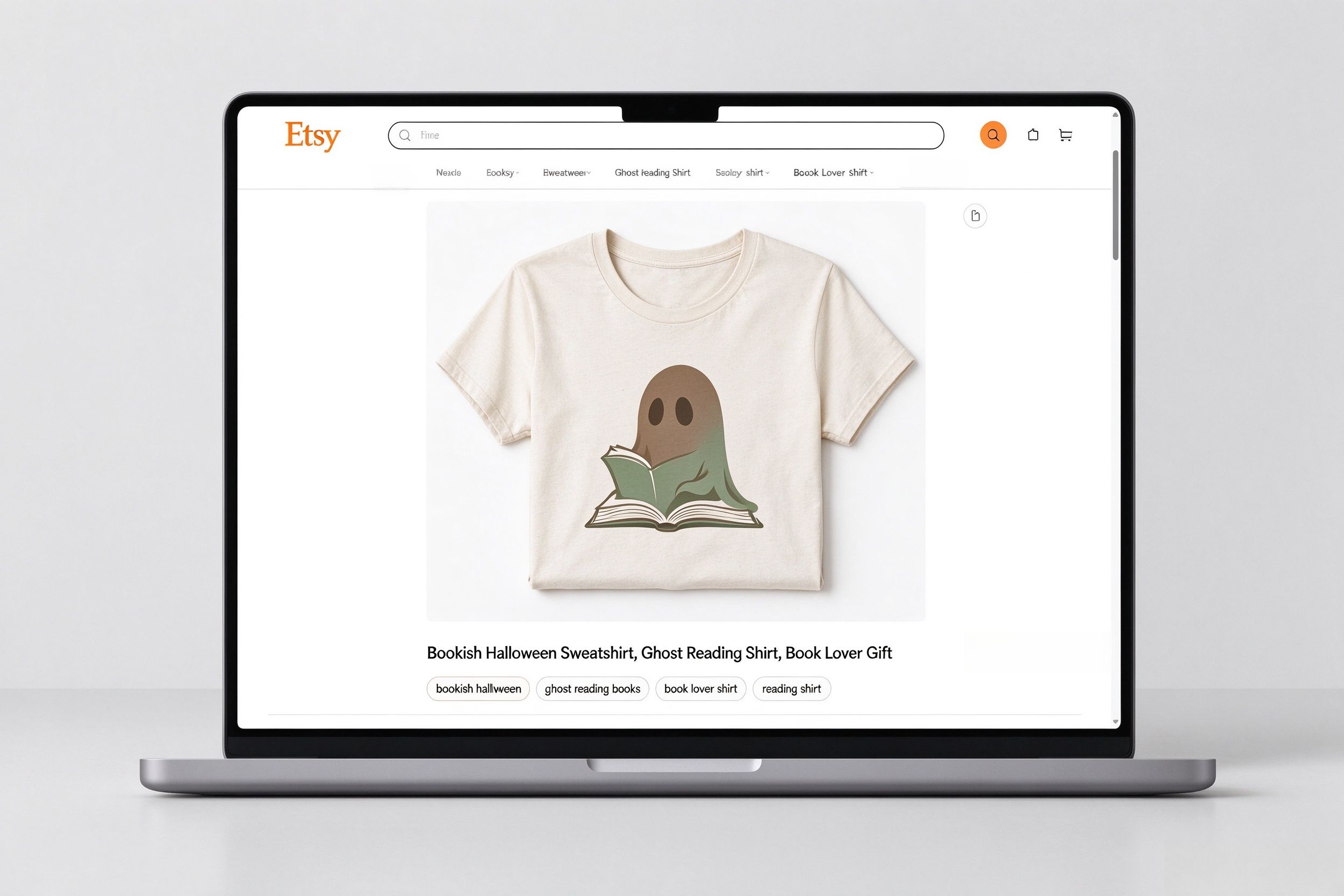 Bookish ghost products that sell year-round - reader wearing ghost shirt in cafe setting