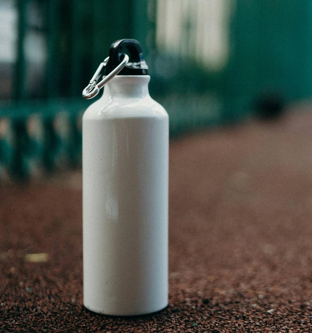 White water bottle on the ground